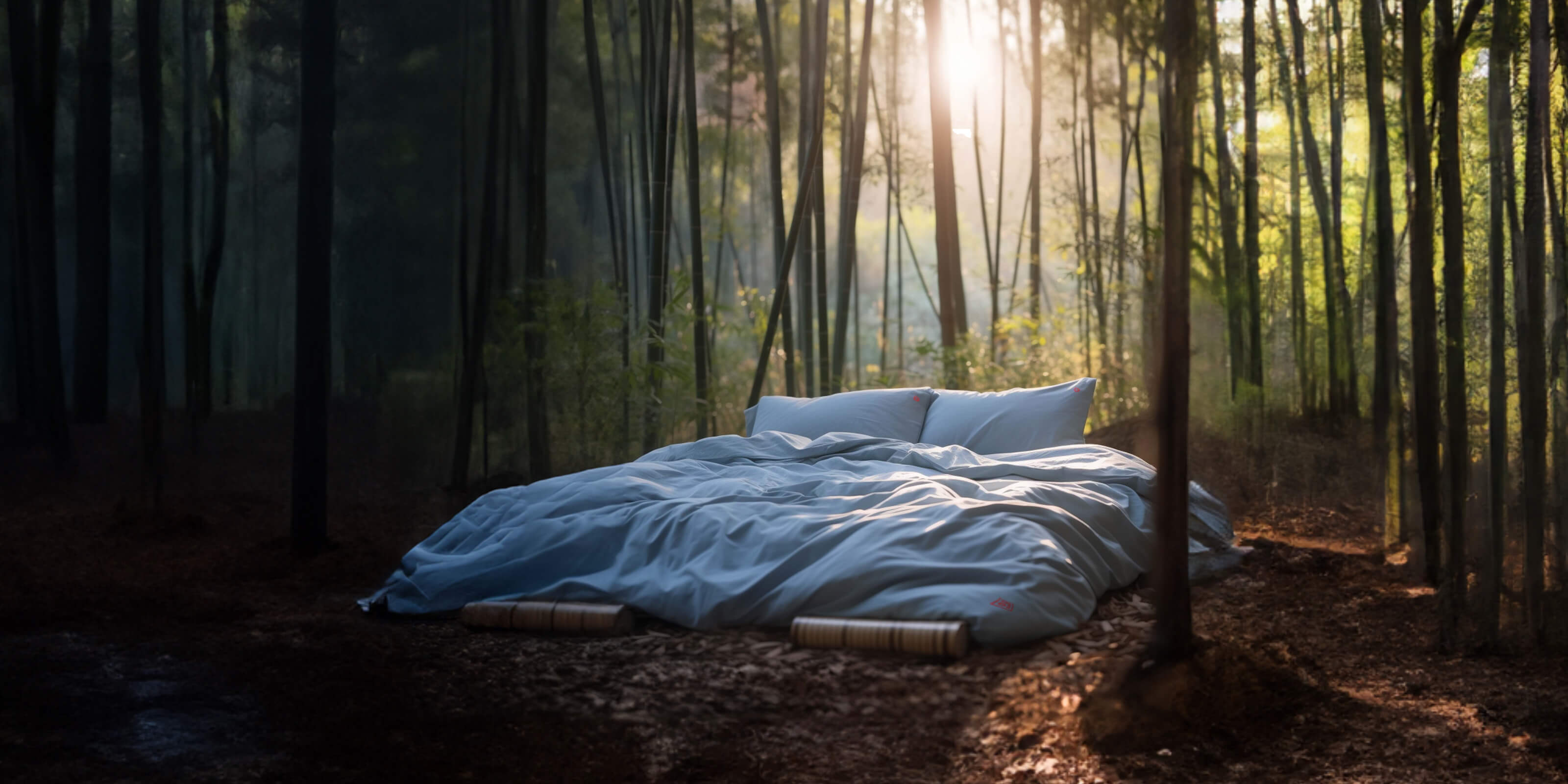 A cozy looking Bed with white Aizome bedding is standing on a Clearance in the Forest