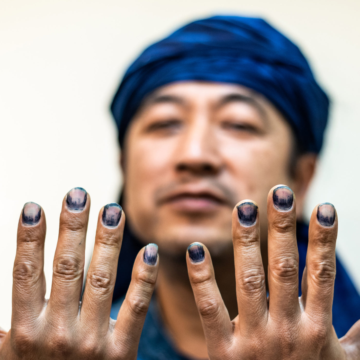 Cozo Cazame showing his with natrual indigo coloured nails 